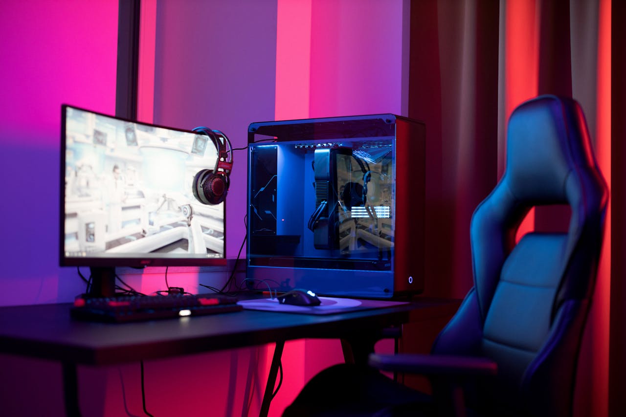 Mastering the First Impression: Your intriguing post title goes here A sleek gaming setup featuring a high-end PC, widescreen monitor, and ergonomic chair lit by neon lights.